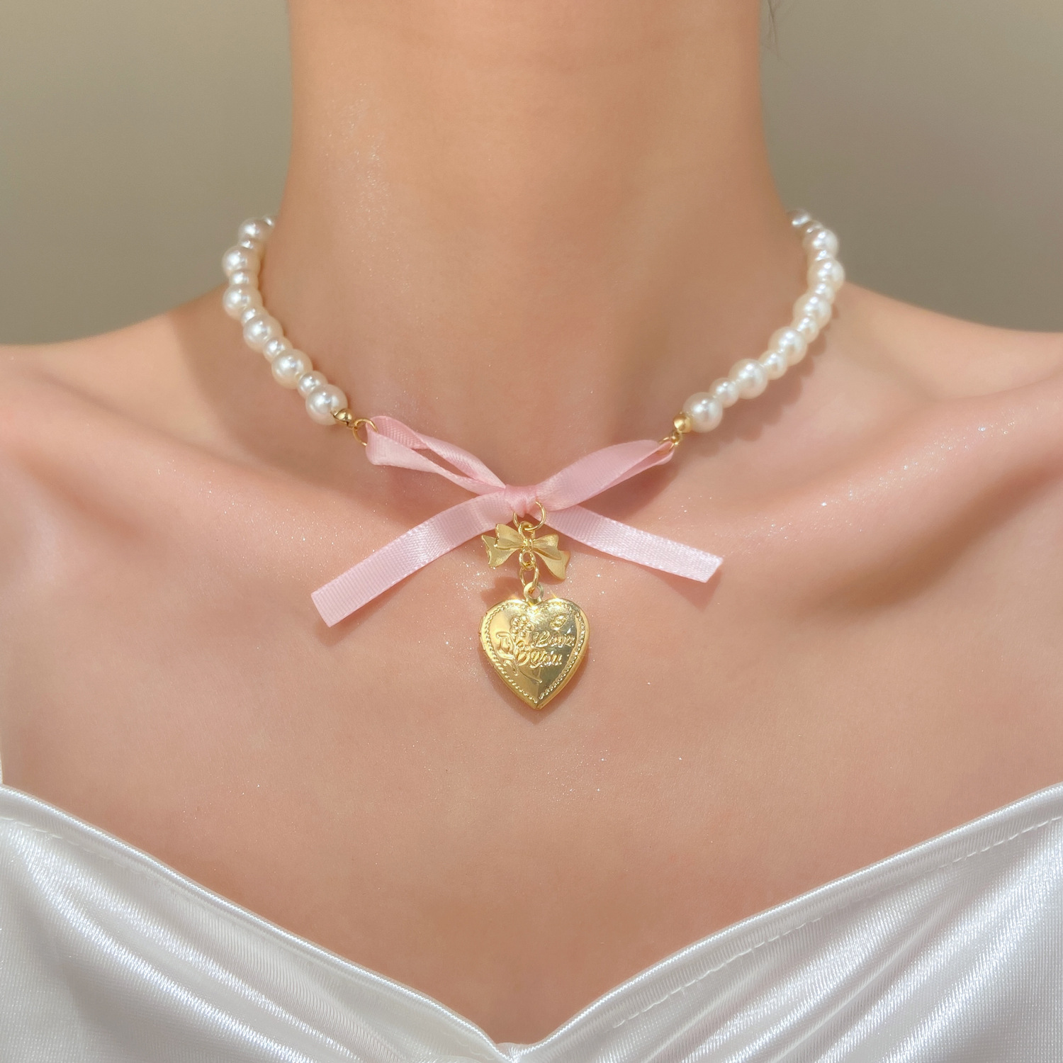 Kalung liontin hati simpul kup - Pearl Trim Chain ulasan dan harga